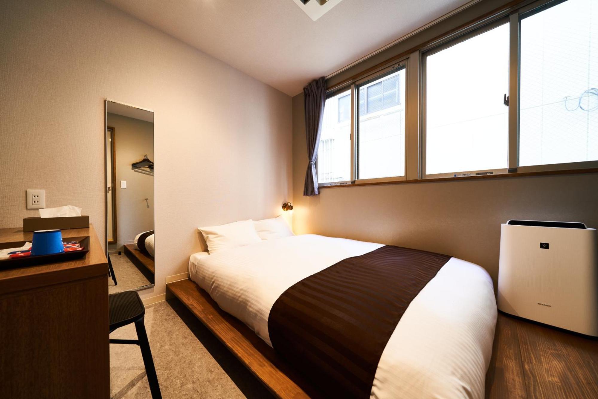 &And Hostel Shinsaibashi East Осака Номер фото